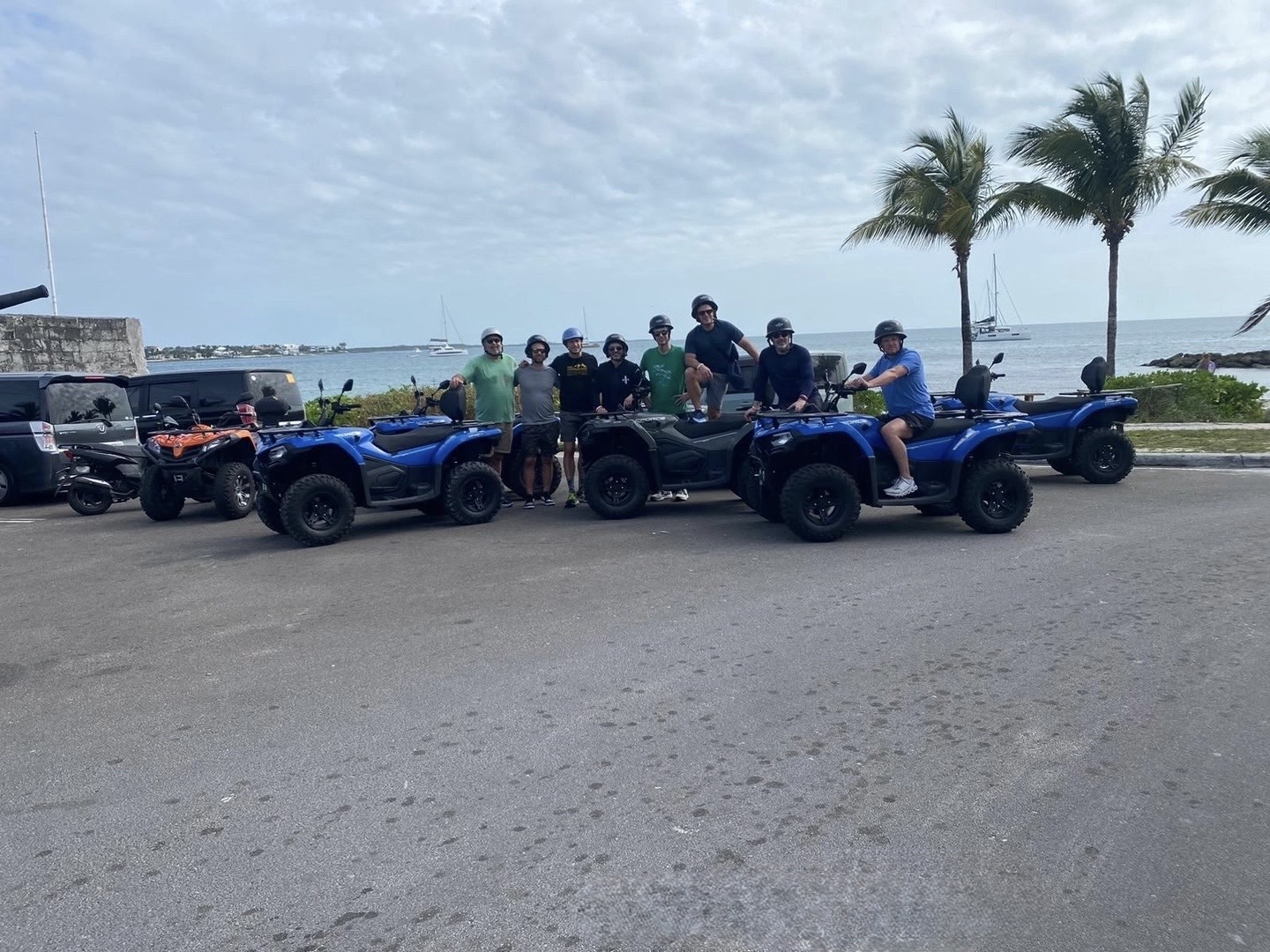 Guests on an ATV group tour by the Nassau oceanfront